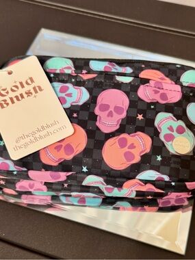 Gold Blush Neon Skulls Dual Mode is a wallet, wristlet or crossbody. BNWT